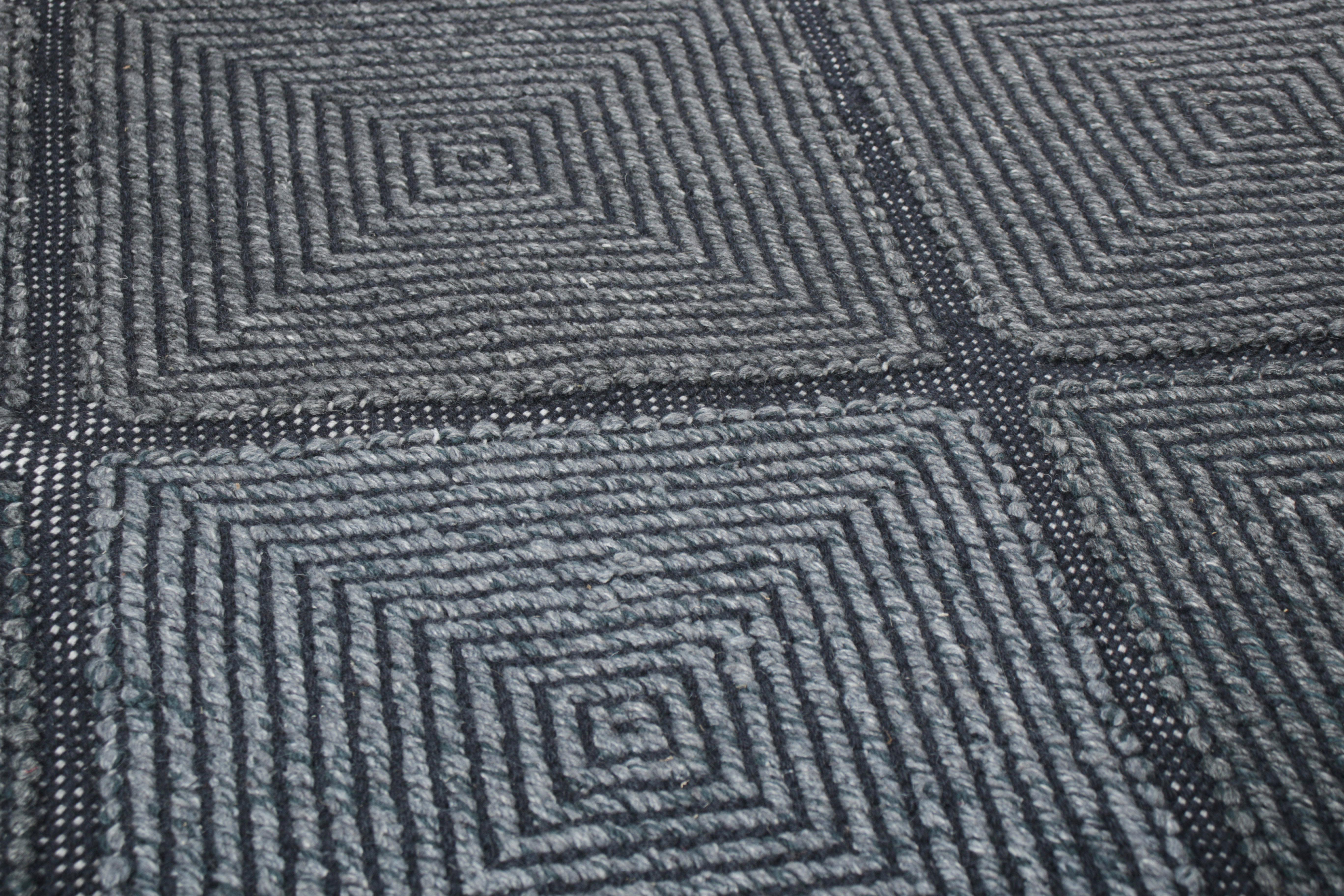 From an exciting new collection of gift-size pieces, this 3x5 Swedish-style accent rug is a bold new addition to the Scandinavian Collection by Rug & Kilim. Handwoven in a wool flatweave with undyed natural yarns as well, its design is inspired by