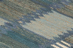 Rug & Kilim’s Scandinavian Style Rug in Blue Tones with Geometric Patterns