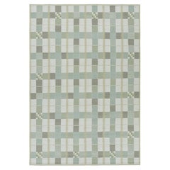Alfombra de estilo escandinavo de Rug & Kilim en tonos azules con motivos geométricos