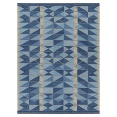 Alfombra de estilo escandinavo de Rug & Kilim en tonos azules con motivos geométricos