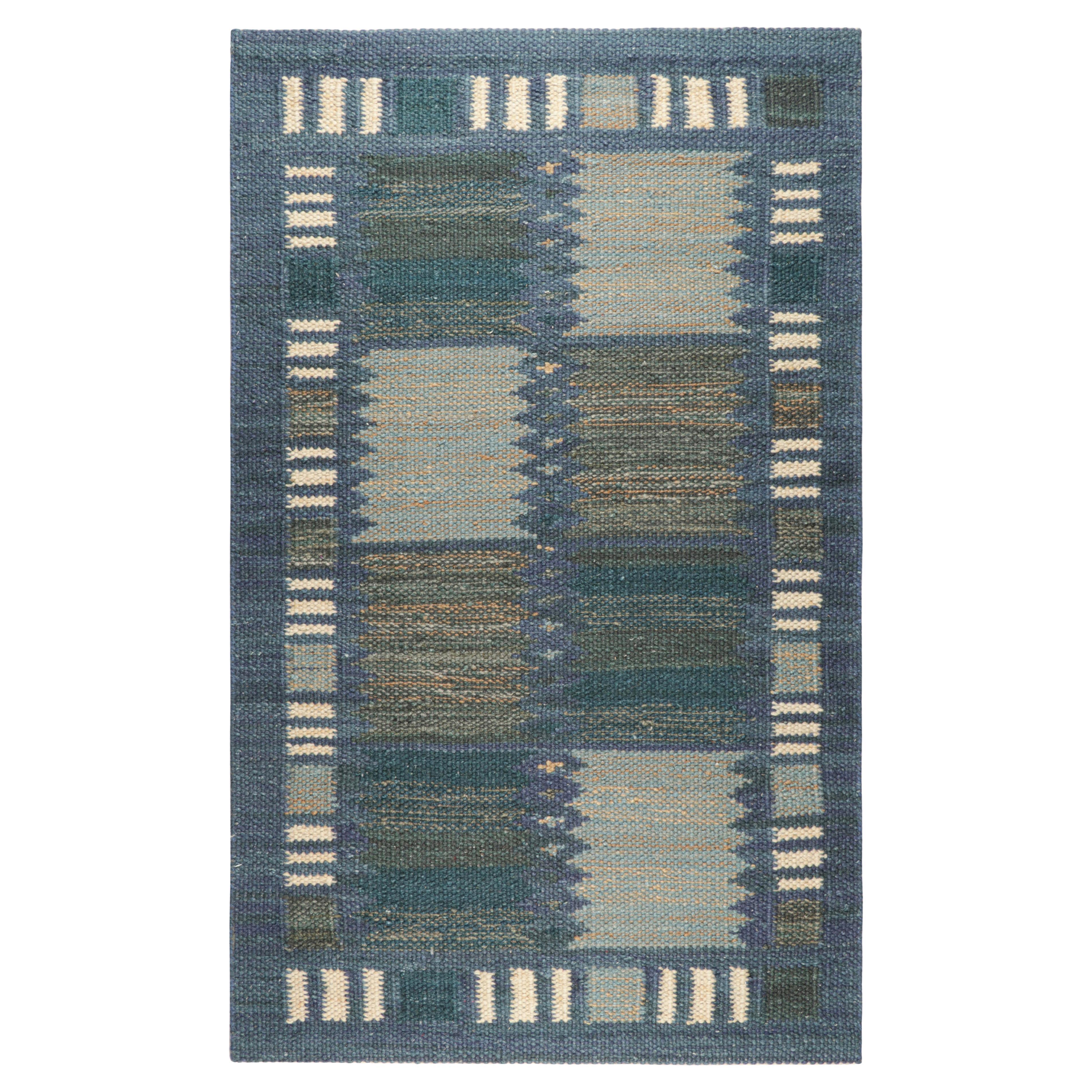 Rug & Kilim's Teppich im skandinavischen Stil in Blautönen mit geometrischen Mustern