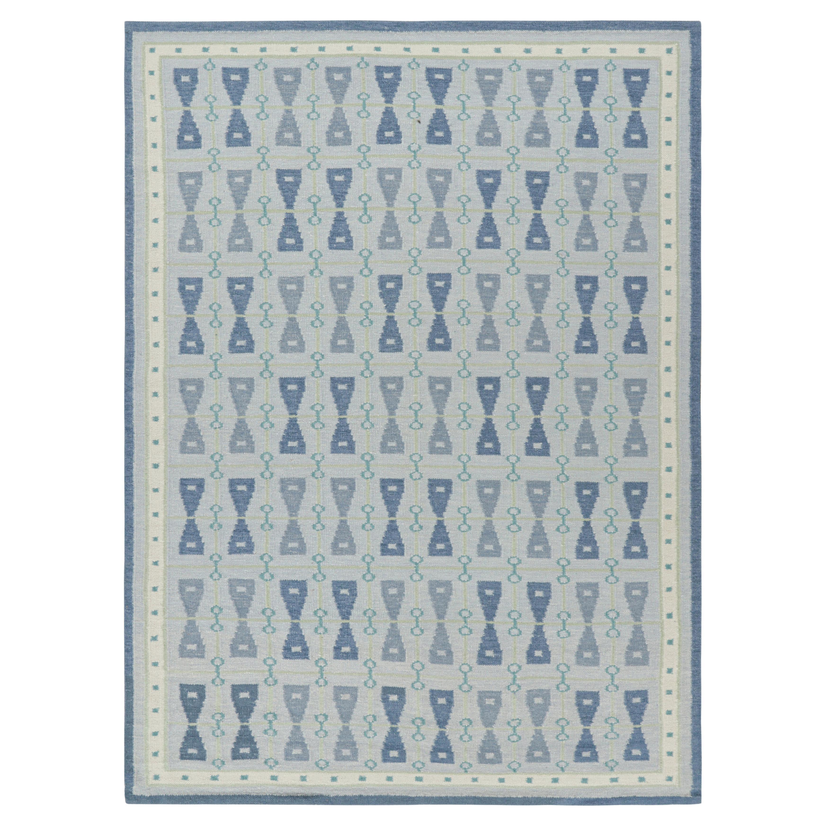 Rug & Kilim’s Scandinavian Style Rug in Blue Tones with Hourglass Patterns