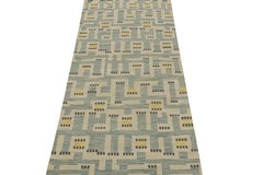 Rug & Kilim’s Scandinavian Style Rug in Blue with Beige & Gold Geometric Pattern