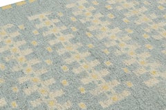 Rug & Kilim’s Scandinavian Style Rug in Blue with Cream Geometric Patterns