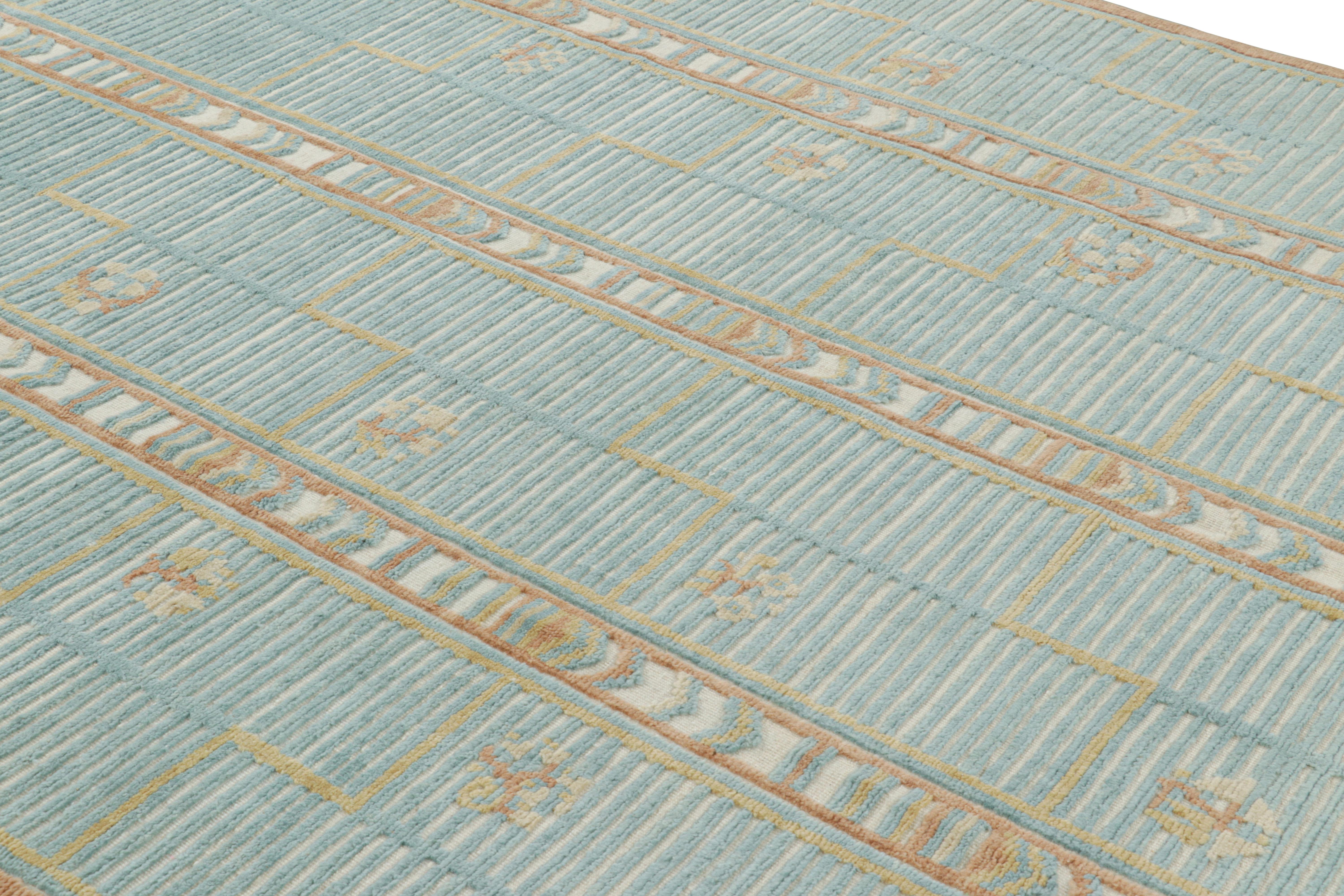 Anudada a mano en lana, esta alfombra de 8x10 pertenece a la línea 