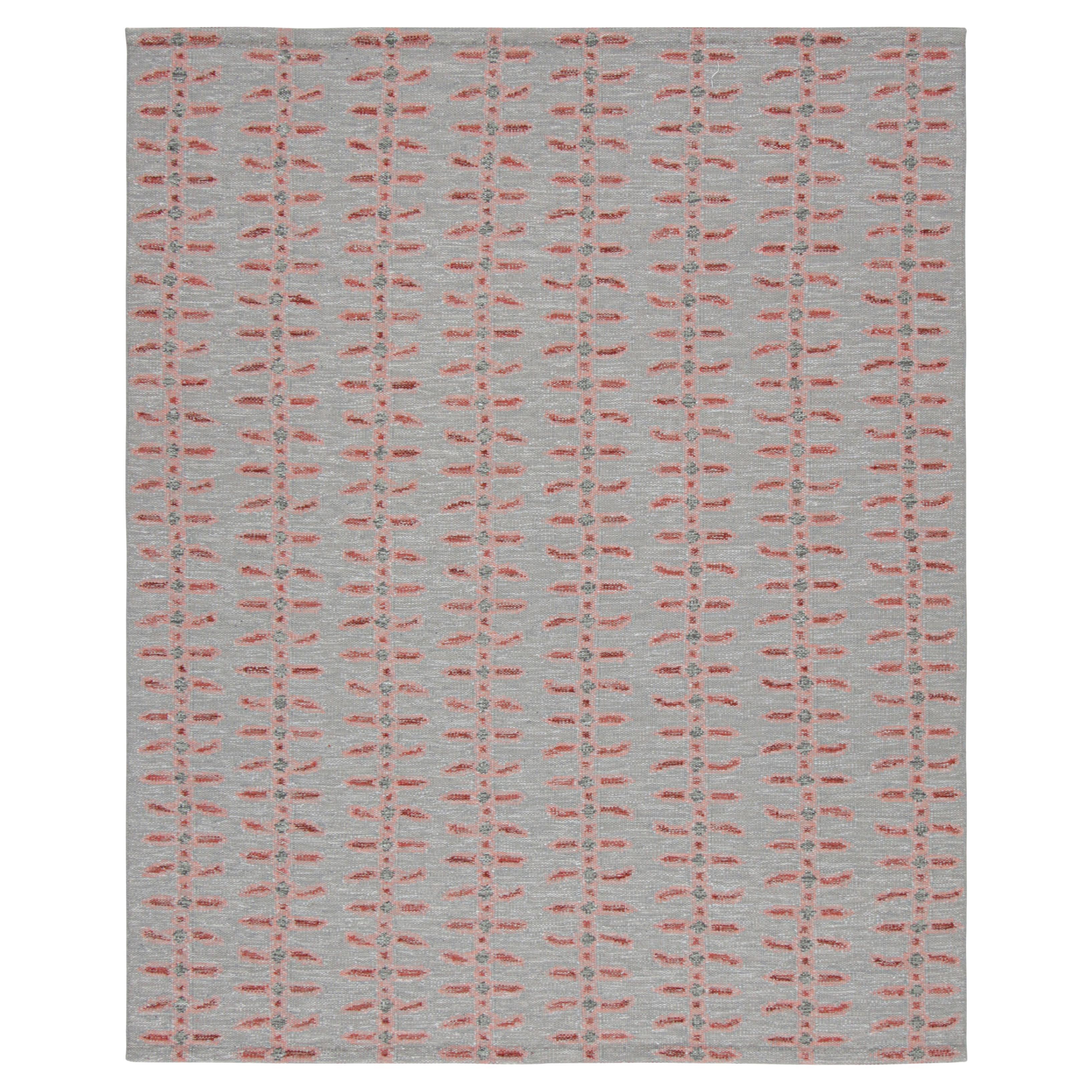 Rug & Kilim’s Scandinavian Style Rug in Blue with Pink and Red Floral Pattern