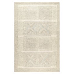 Rug & Kilim's Teppich im skandinavischen Stil in Creme und Beige mit geometrischen Mustern