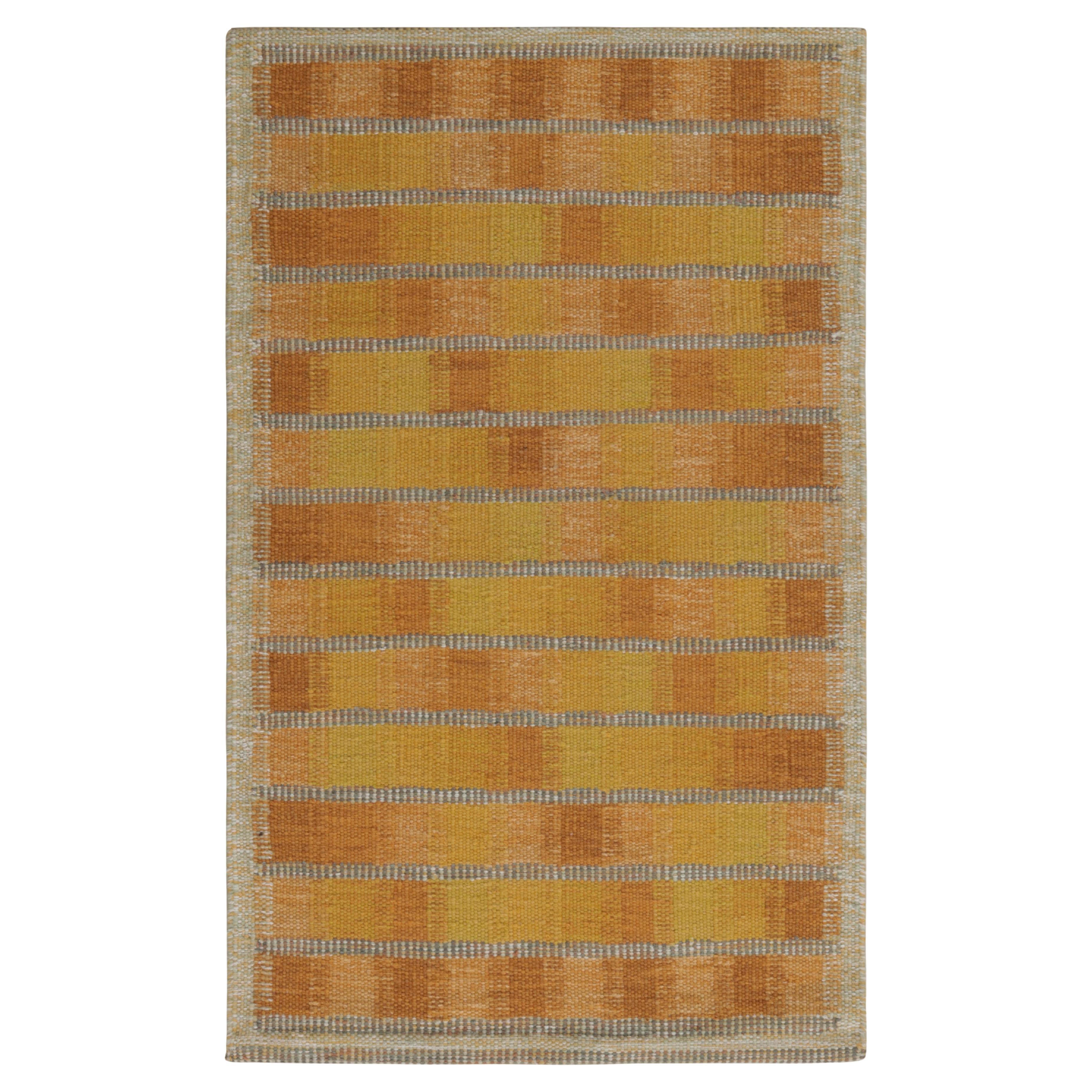 Rug & Kilim’s Scandinavian Style Rug in Gold and Pink, with Geometric Patterns