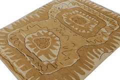 Rug & Kilim’s Scandinavian Style rug in Gold with Geometric Patterns