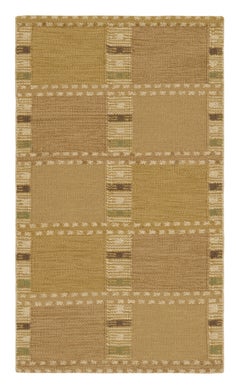 Tapis de style scandinave doré à motifs géométriques de Rug & Kilim