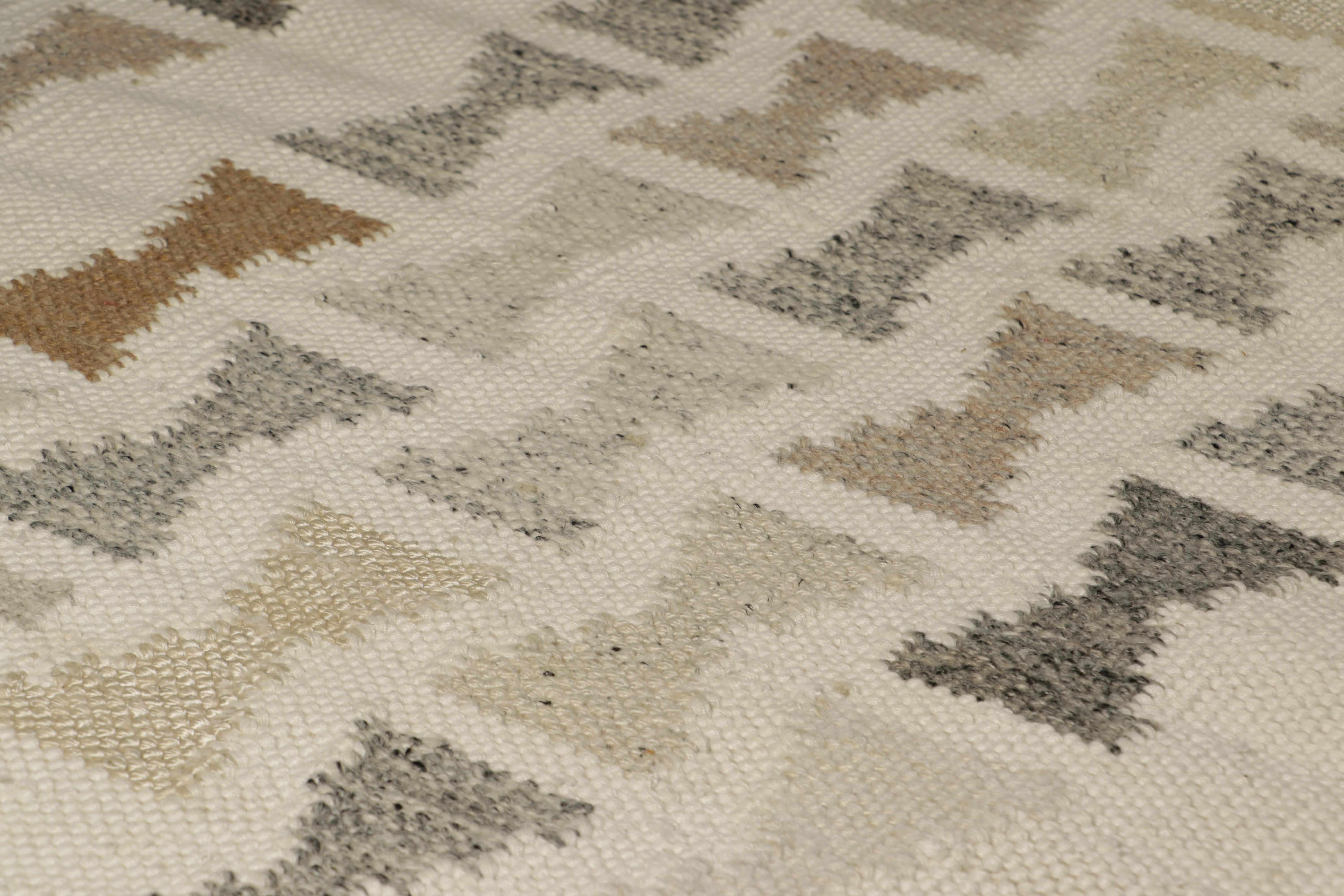 From an exciting new collection of gift-size pieces, this 3x5 Swedish-style accent rug is a bold new addition to the Scandinavian Collection by Rug & Kilim. Handwoven in a wool flatweave with undyed natural yarns as well, its design is inspired by