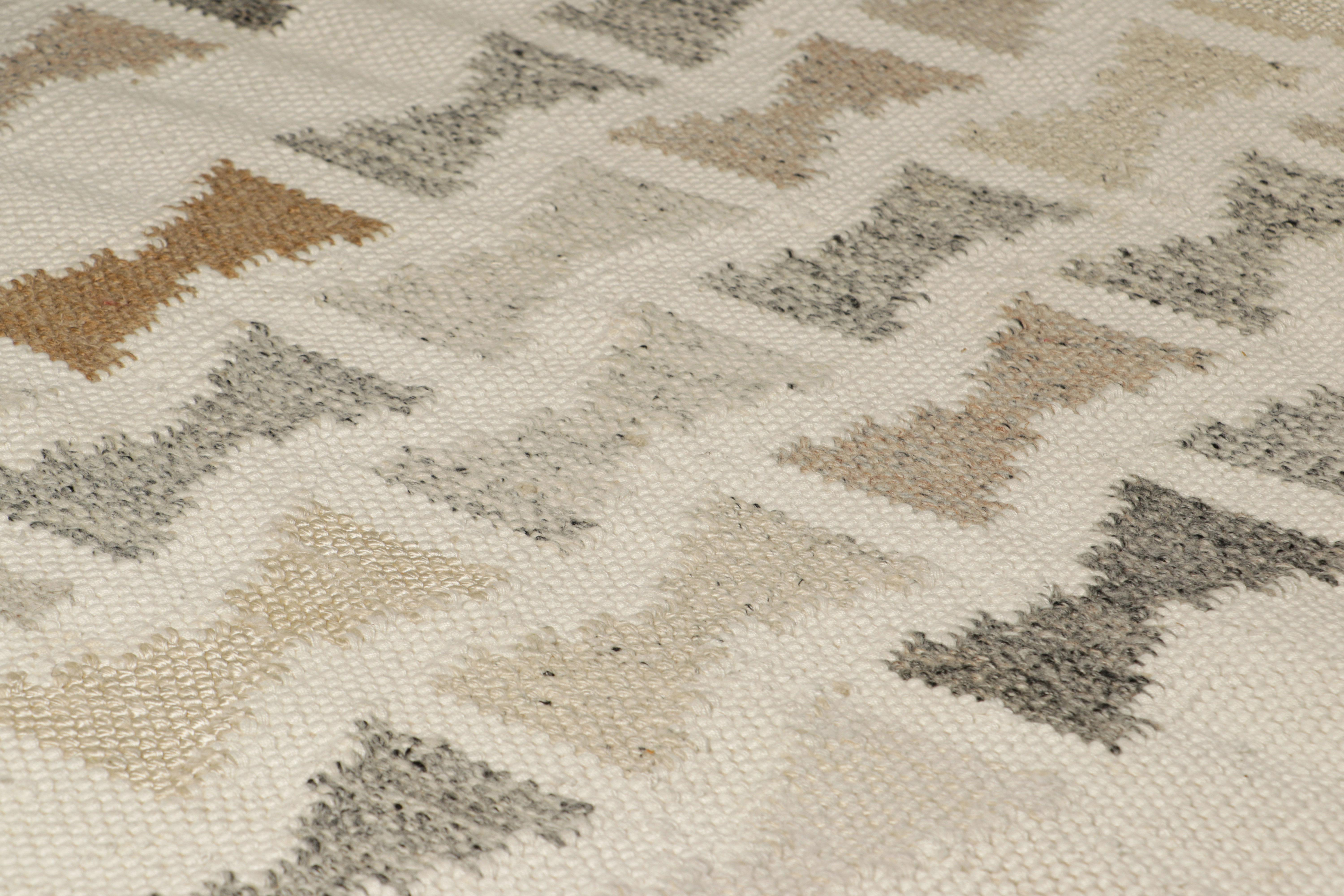 Da una nuova ed entusiasmante collezione di pezzi in formato regalo, questo tappeto d'accento 3x5 in stile svedese è un'audace novità della Scandinavian Collection di Rug & Kilim. Tessuta a mano in un intreccio piatto di lana con filati naturali non