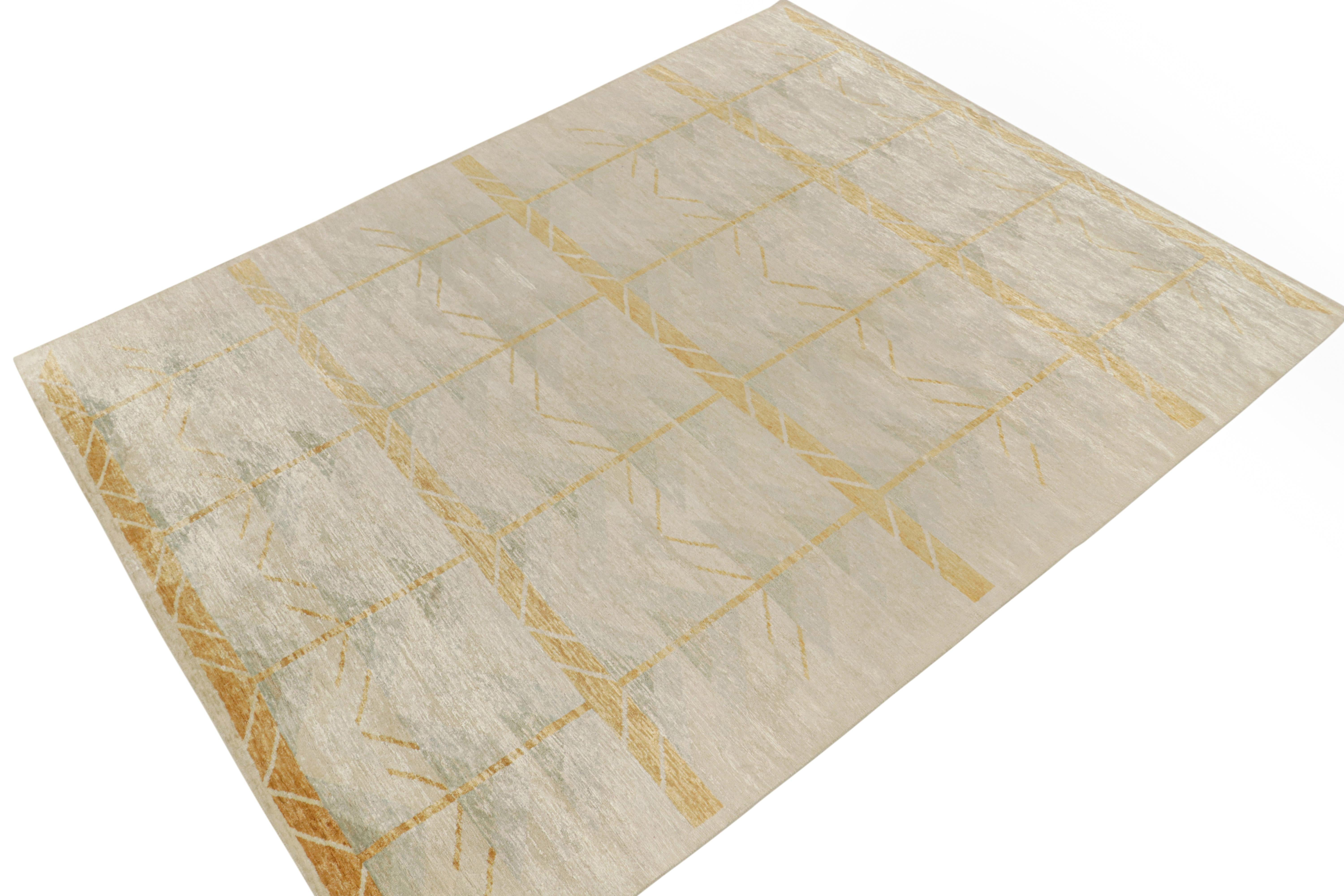 Hand-knotted in silk, from Rug & Kilim’s acclaimed Scandinavian rug collection reimagining the celebrated Mid-Century Modern style. 

This piece enjoys an experimental take on the Swedish Deco geometric pattern in luscious gray, blue and gold with