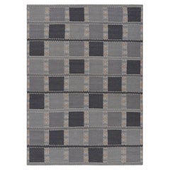 Tapis de style scandinave dans les tons gris avec motifs géométriques de Rug & Kilim