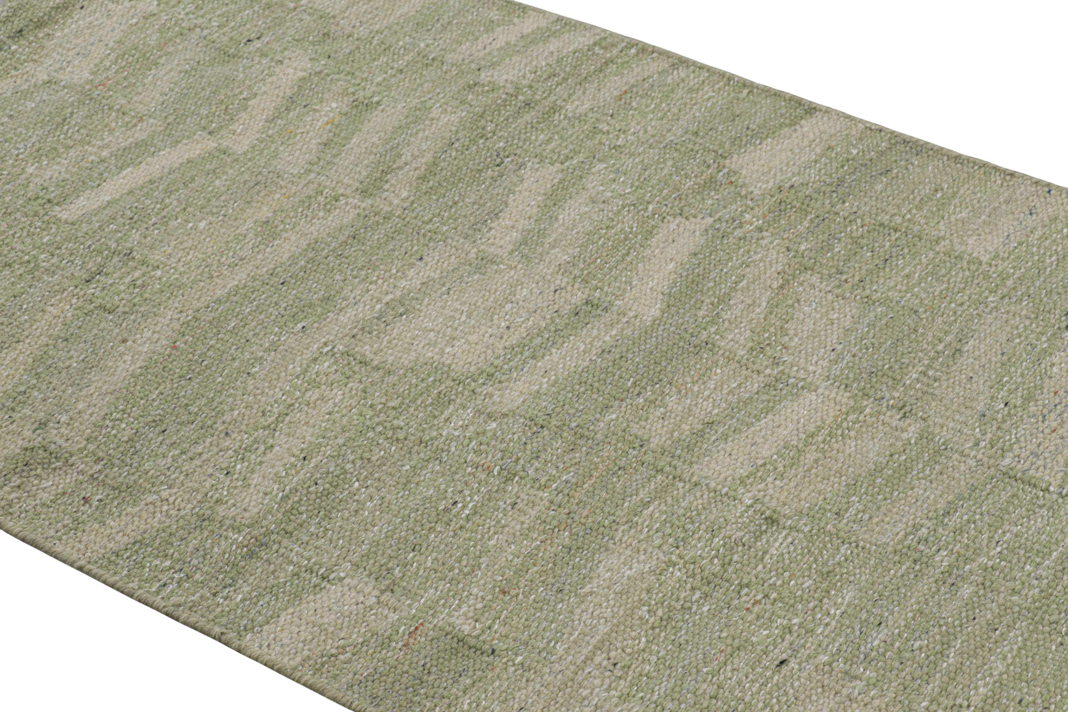 Realizzato in lana intrecciata a mano, questo tappeto 3x5 è un'entusiasmante novità della collezione di tappeti scandinavi di Rug & Kilim: una rivisitazione contemporanea del minimalismo svedese e dei tappeti e tessuti vintage delle tradizioni
