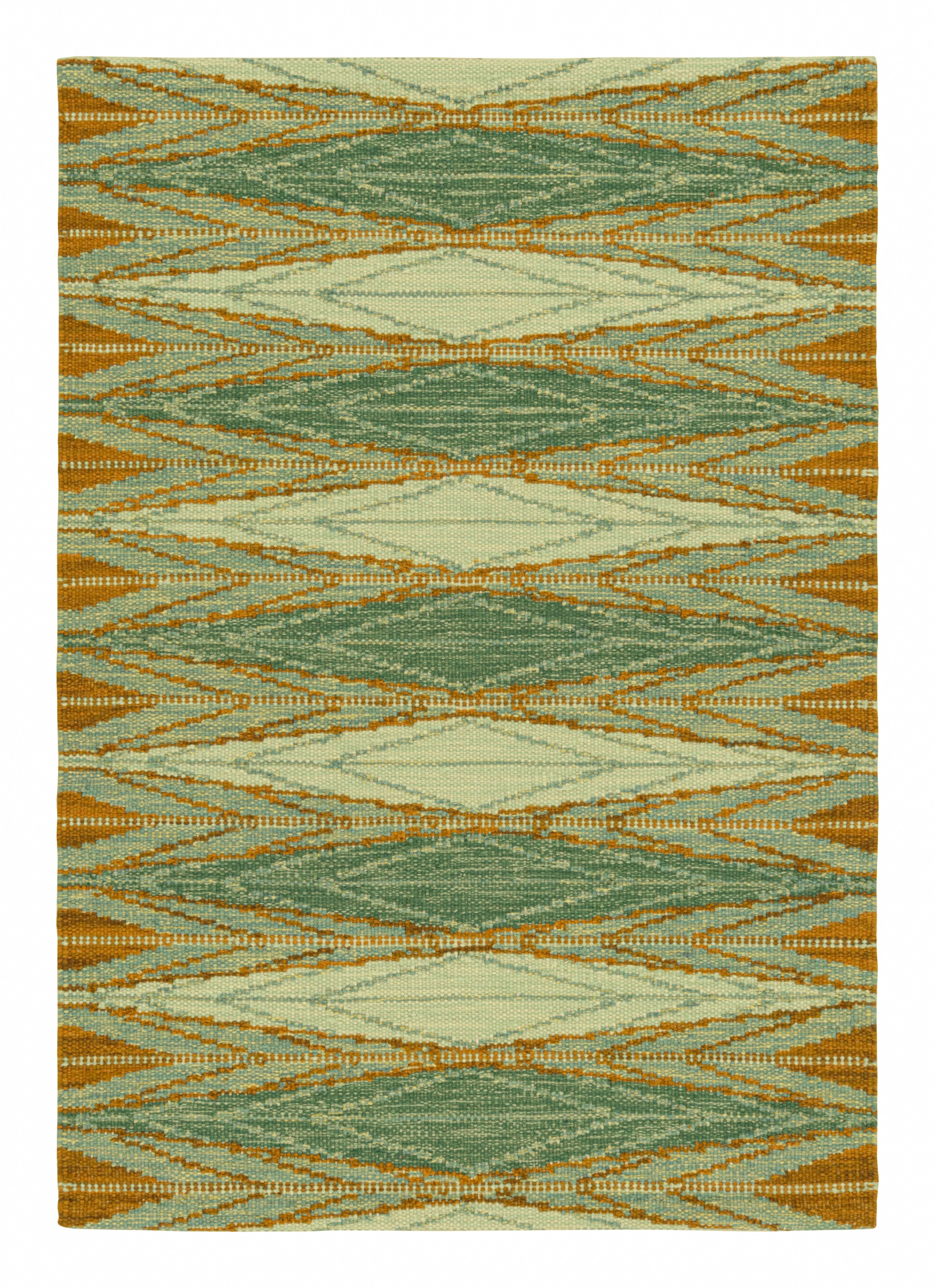 Tapis de style scandinave de Rug & Kilim en vert, avec des motifs géométriques orange