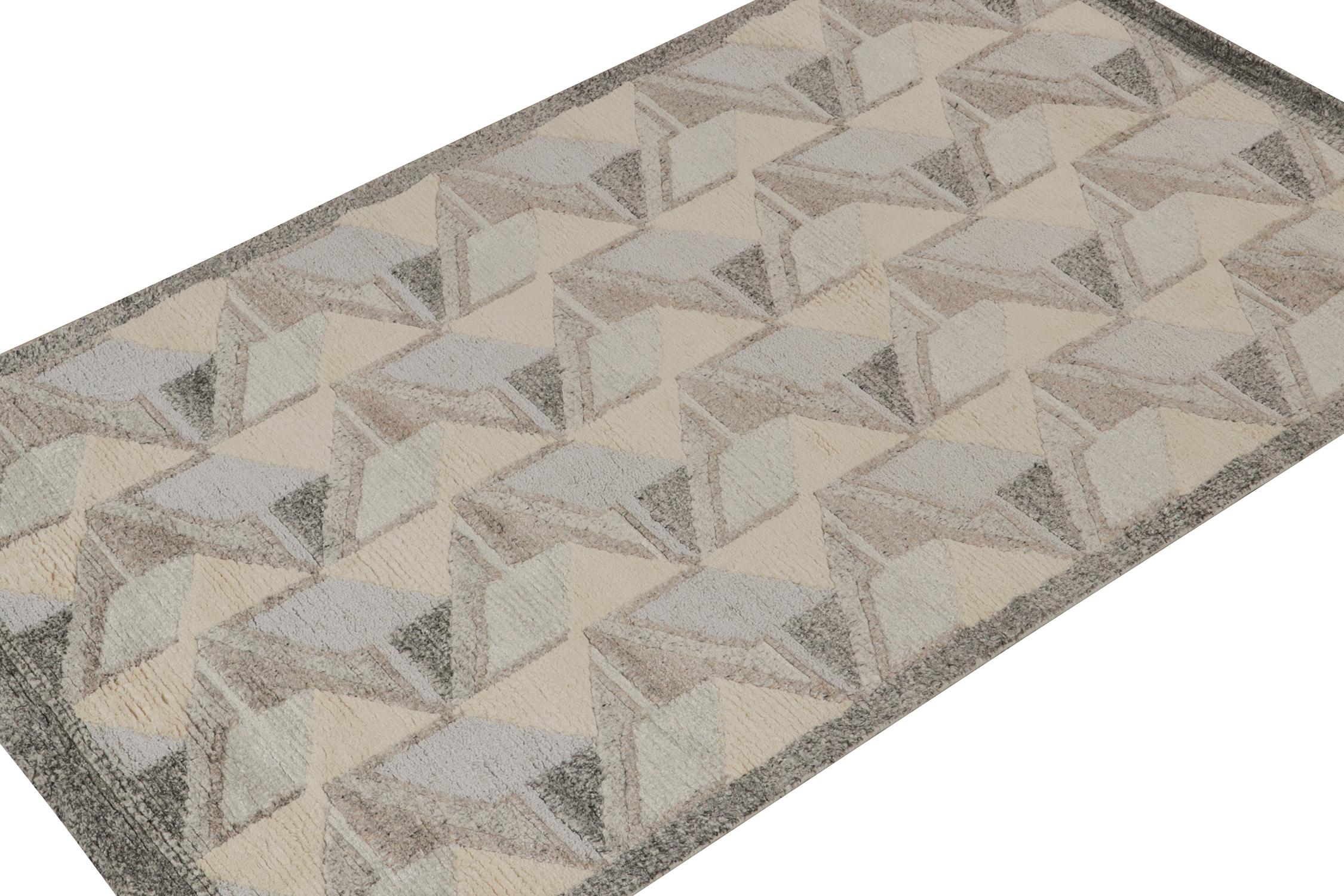 A smart 4x8 Swedish style pile rug from our award-winning Scandinavian collection. Hand-knotted in wool. 
On the Design: 
This rug enjoys a natural movement with crisp geometric patterns in ivory, blue and gray with cool, complementary presence.