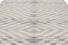 Rug & Kilim’s Scandinavian Style Rug in Light Gray and Blue Geometric Pattern