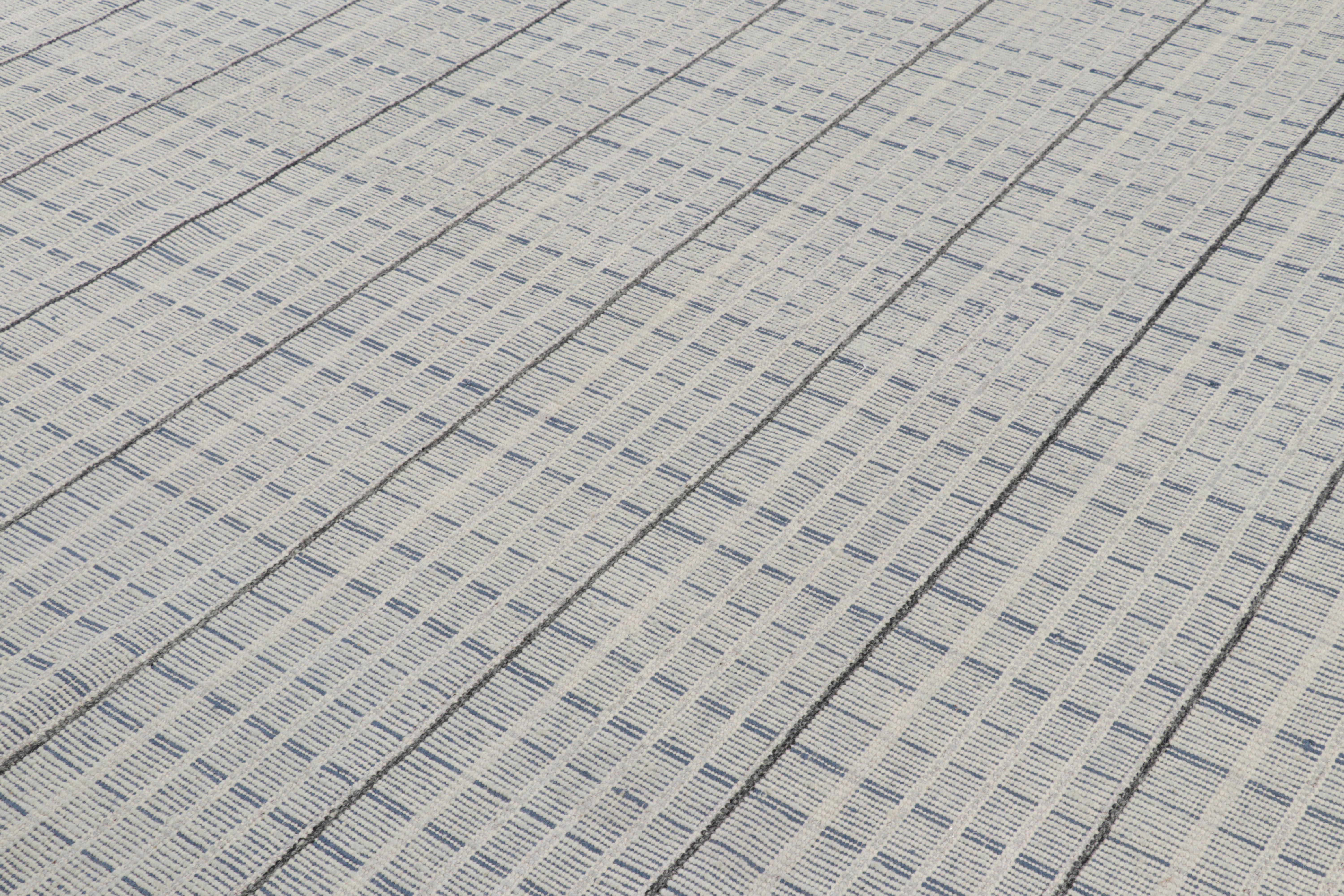 Handwoven in a wool flatweave, this 9x12 Scandinavian flat weave rug is from a particular line of our Scandinavian flatweaves called Smart Loom, known for its intricacy and an interesting contemporary approach to gradation with geometric patterns.