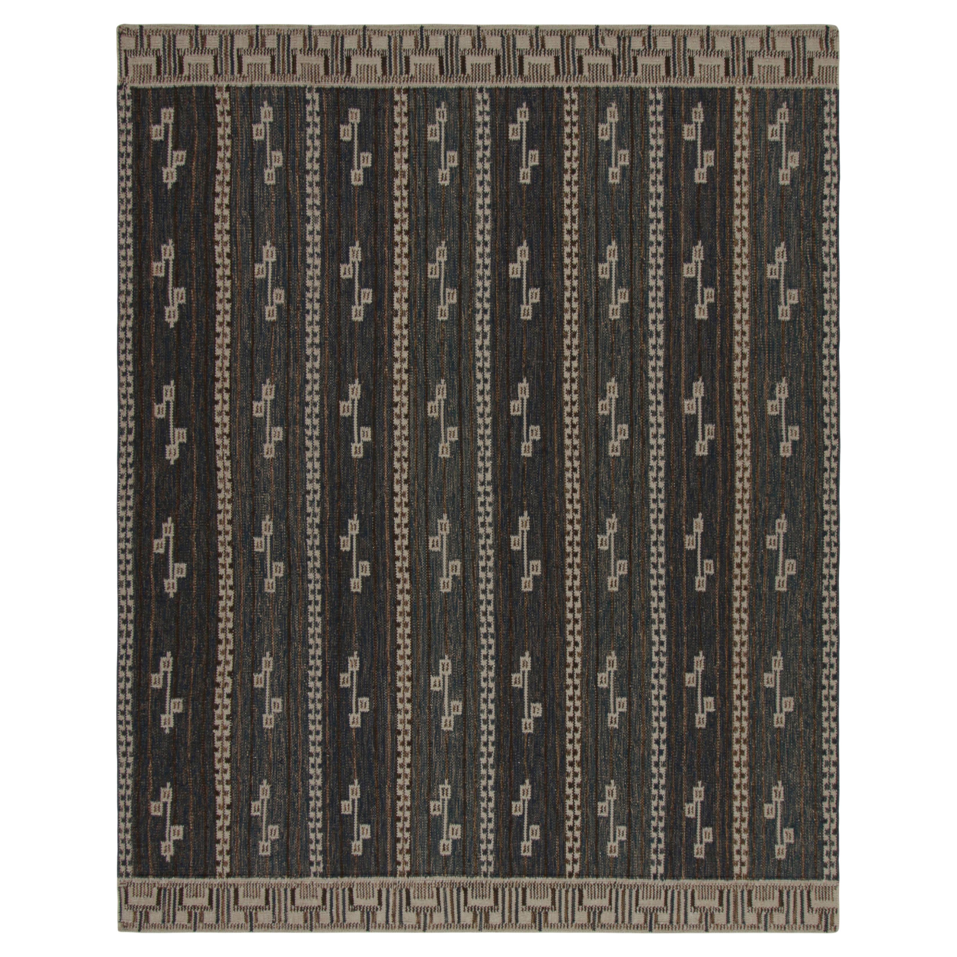Rug & Kilim’s Scandinavian Style Rug in Navy Blue with Brown Geometric Patterns