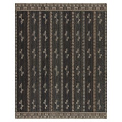 Rug & Kilim’s Scandinavian Style Rug in Navy Blue with Brown Geometric Patterns
