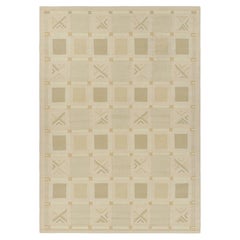 Tapis de style scandinave rose et crème à motifs géométriques de Rug & Kilim