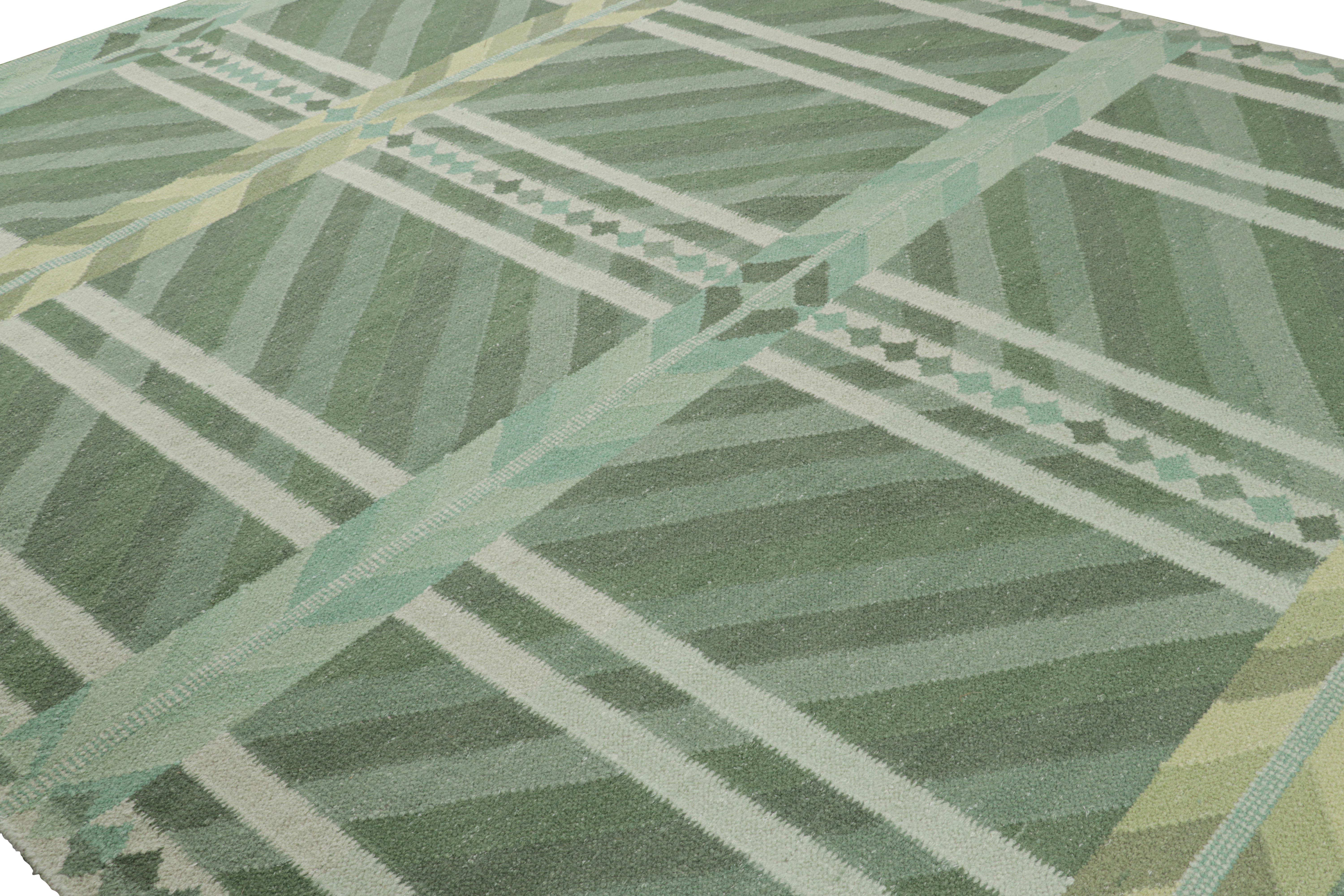 Issu de la Collection Scandinave de Rug & Kilim, ce tapis 10x14 est tissé à la main dans une nouvelle construction à armure plate utilisant un mélange de laine et de fils exotiques - une nouvelle texture douce inspirée des fils d'alpaga. Il s'agit