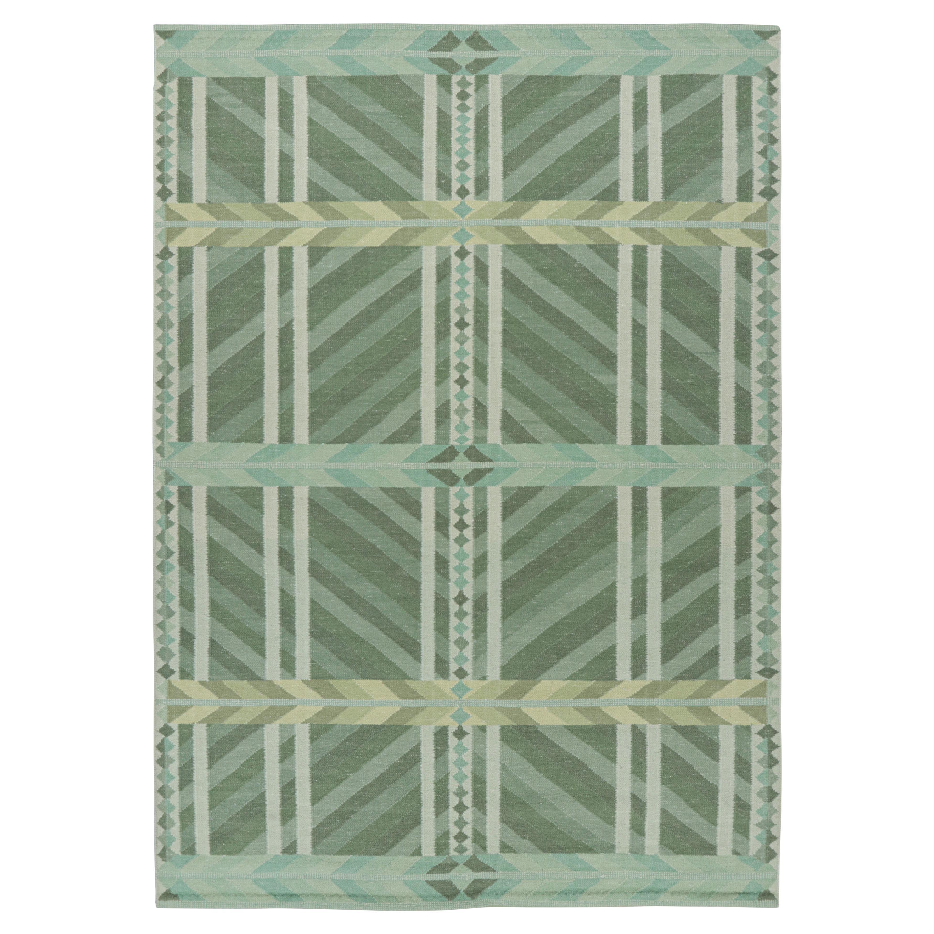 Rug
Kilim
s Teppich im skandinavischen Stil in blaugrün und grün mit geometrischen Mustern