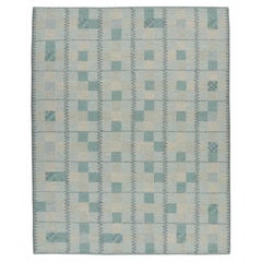 Rug & Kilim’s Scandinavian Style Rug in Teal Blue Tones with Geometric Patterns
