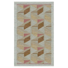 Rug & Kilim’s Scandinavian Style Rug in White, Beige and Pink Geometric Pattern