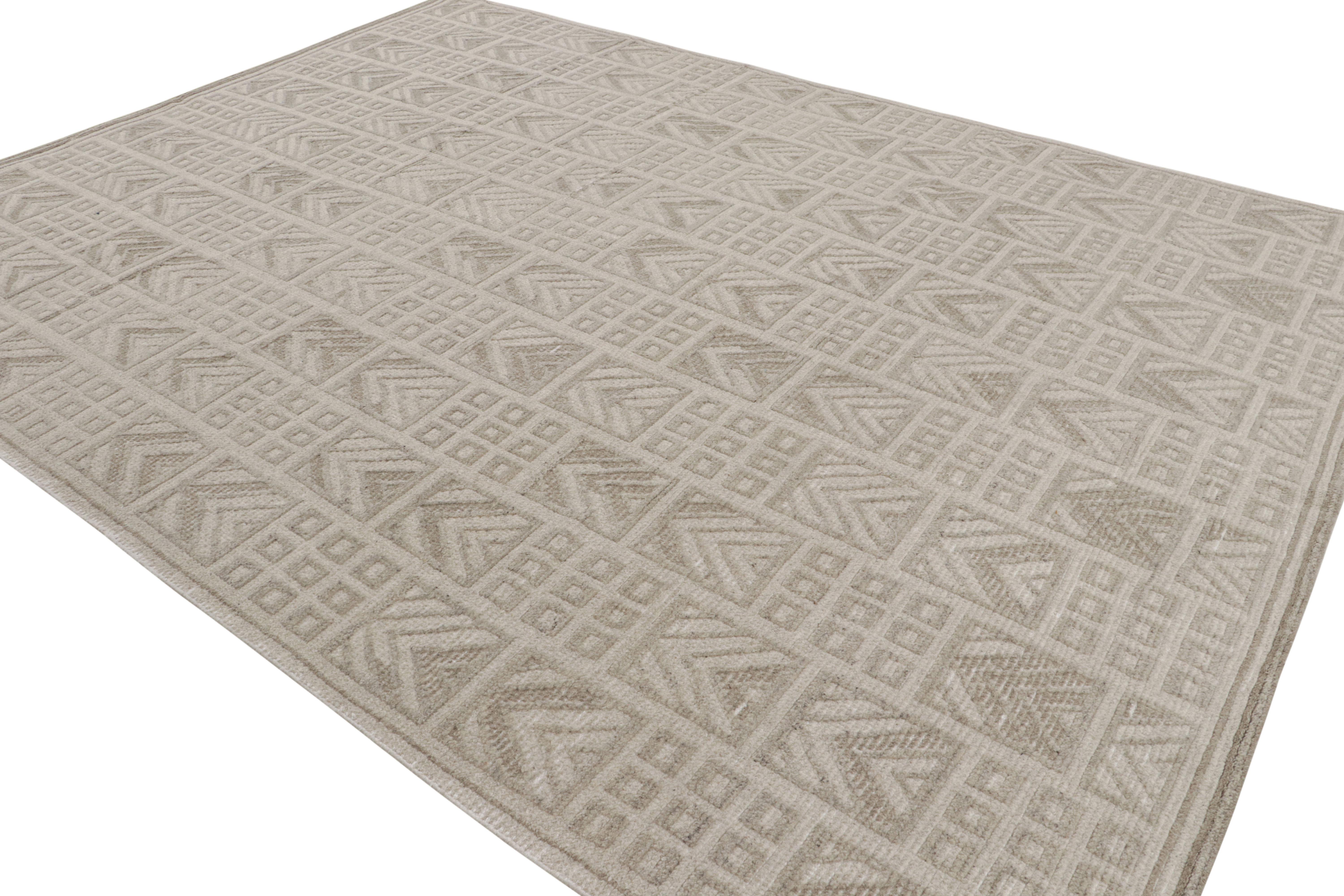 Als Neuzugang in der Scandinavian Collection'S von Rug & Kilim spiegelt dieser handgeknüpfte Wollteppich im Format 9x12 eine zeitgenössische Interpretation des Rollakans und des schwedischen Deco-Stils aus der Mitte des Jahrhunderts wider.

Über das