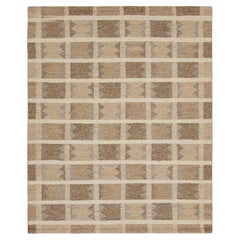 Tapis de style scandinave à motifs géométriques beige-brun de Rug & Kilim