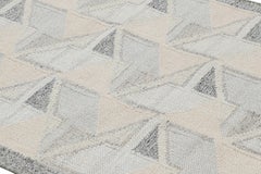 Tapis de style scandinave à motif géométrique bleu et crème de Rug & Kilim