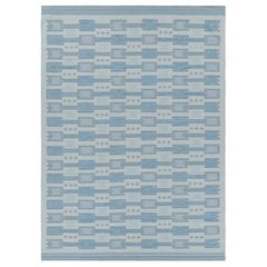 Tapis de style scandinave à motifs géométriques bleus de Rug & Kilim