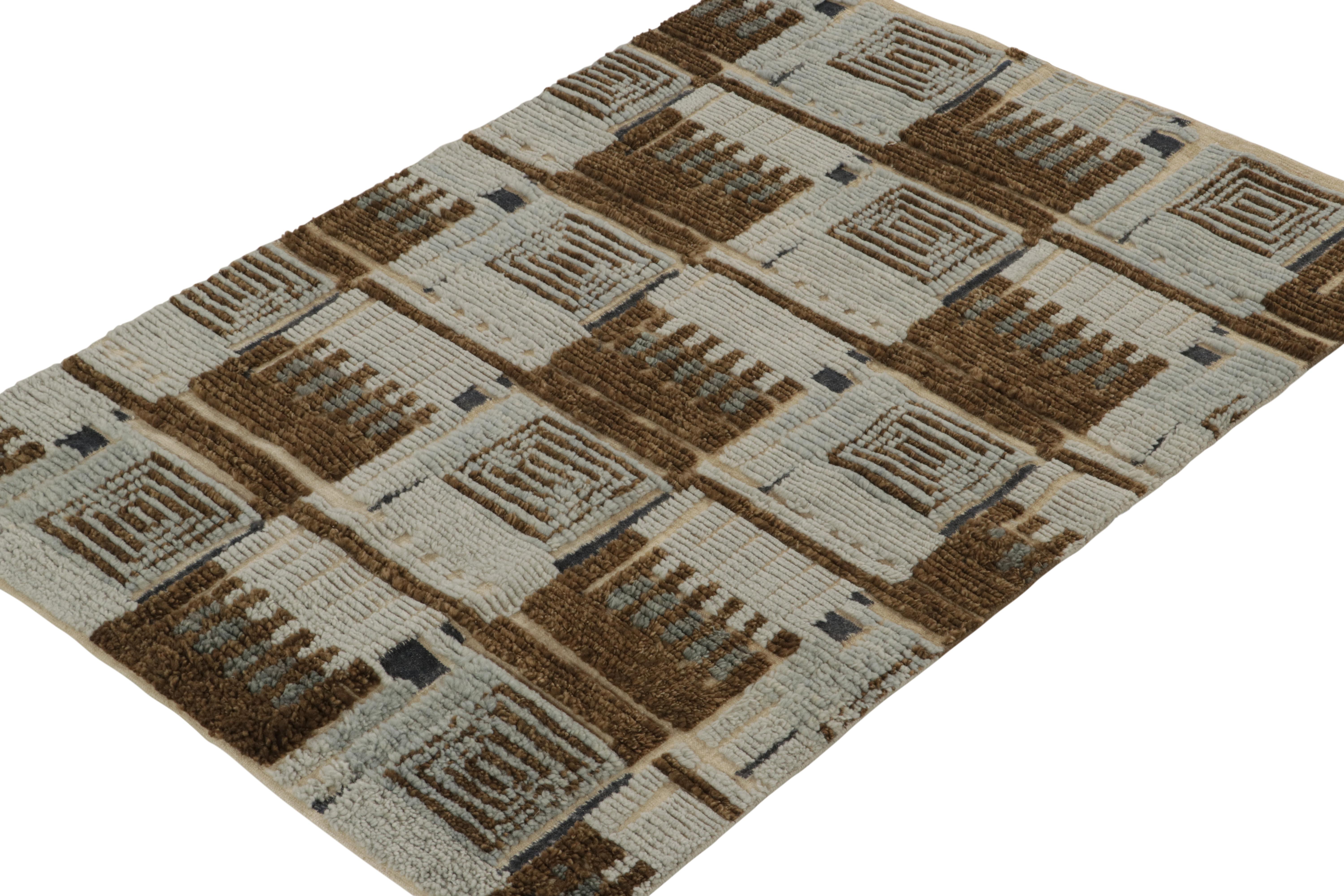 A smart 4x6 Swedish style rug from our award-winning Scandinavian collection. Hand-knotted in wool. 

On the Design: 

This rug enjoys a unique high low texture married to geometric patterns in crisp, icey blue, brown and off-white. Keen eyes will