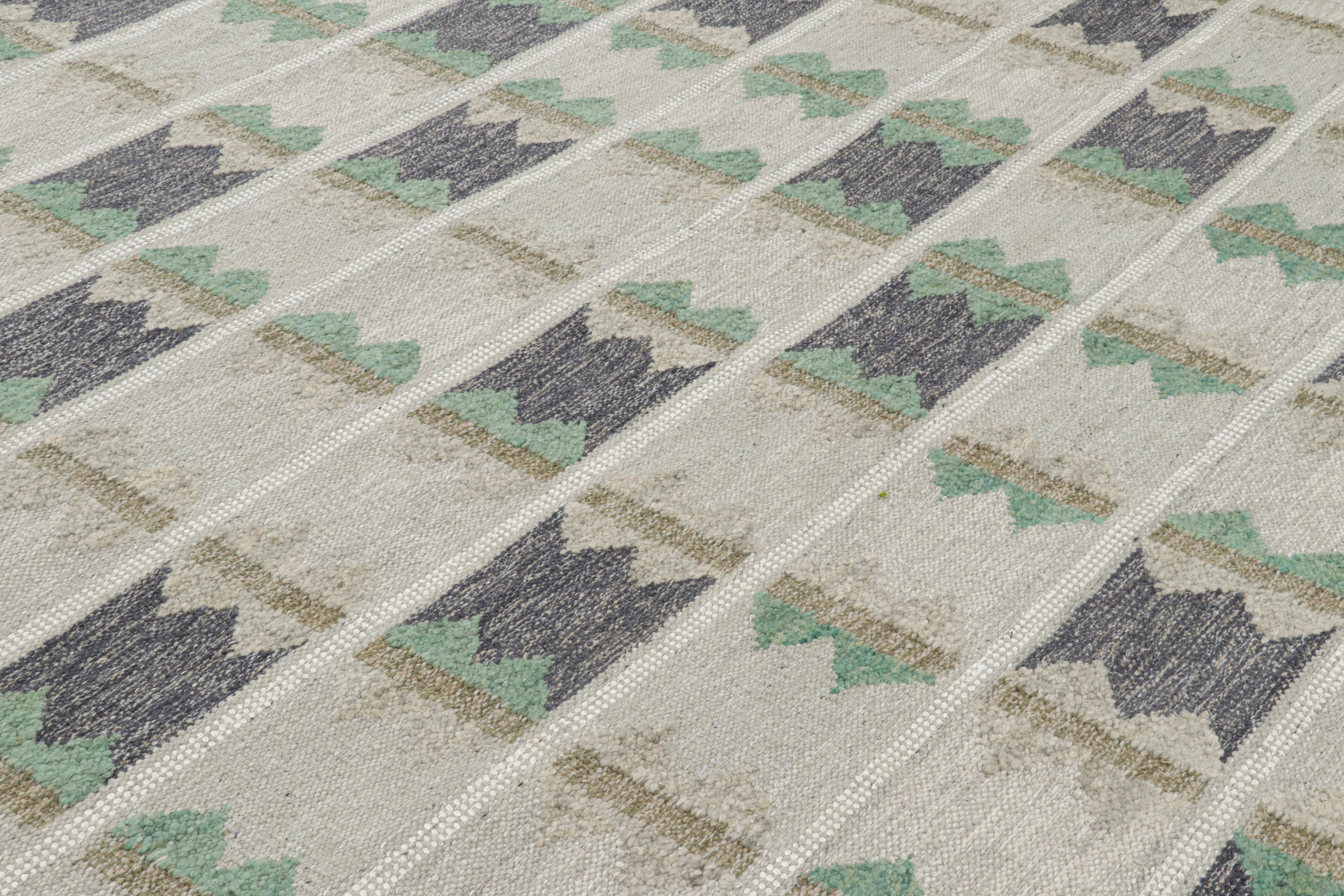 Dieser moderne Teppich im Format 9x13 im schwedischen Stil ist eine kühne Neuheit in der Scandinavian Collection'S von Rug & Kilim. Das handgewebte Flachgewebe aus Wolle mit ungefärbten Naturgarnen ist von schwedischen minimalistischen Designs