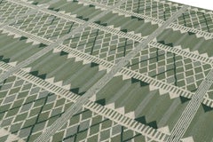 Rug & Kilim’s Scandinavian Style Rug with Geometric Patterns in Tones of Green