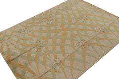 Rug & Kilim’s Scandinavian Style Rug with Gold and Green Geometric Patterns