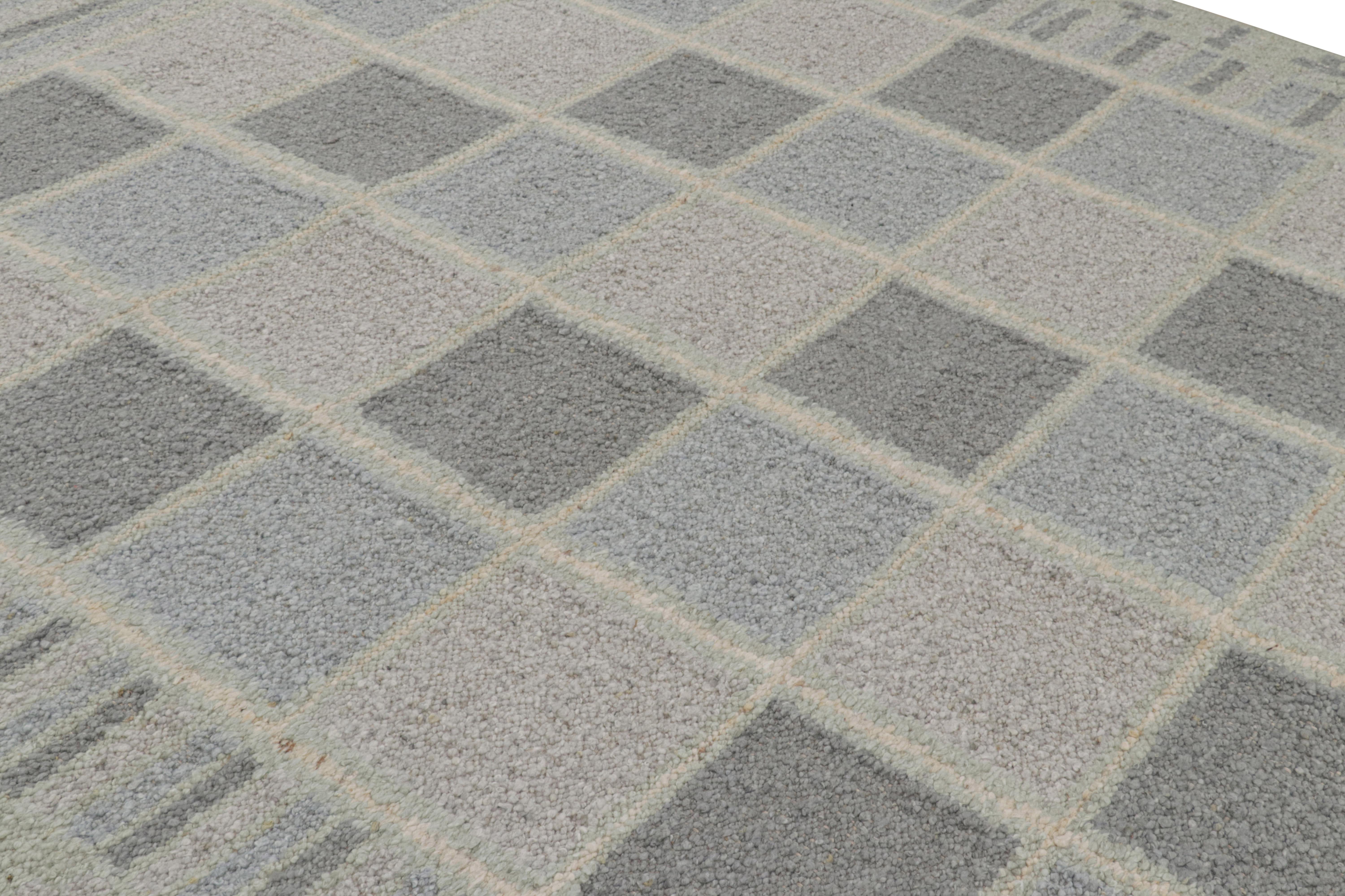 Tejido a mano en lana, este elegante tejido plano de 9x12 de estilo sueco es la textura 