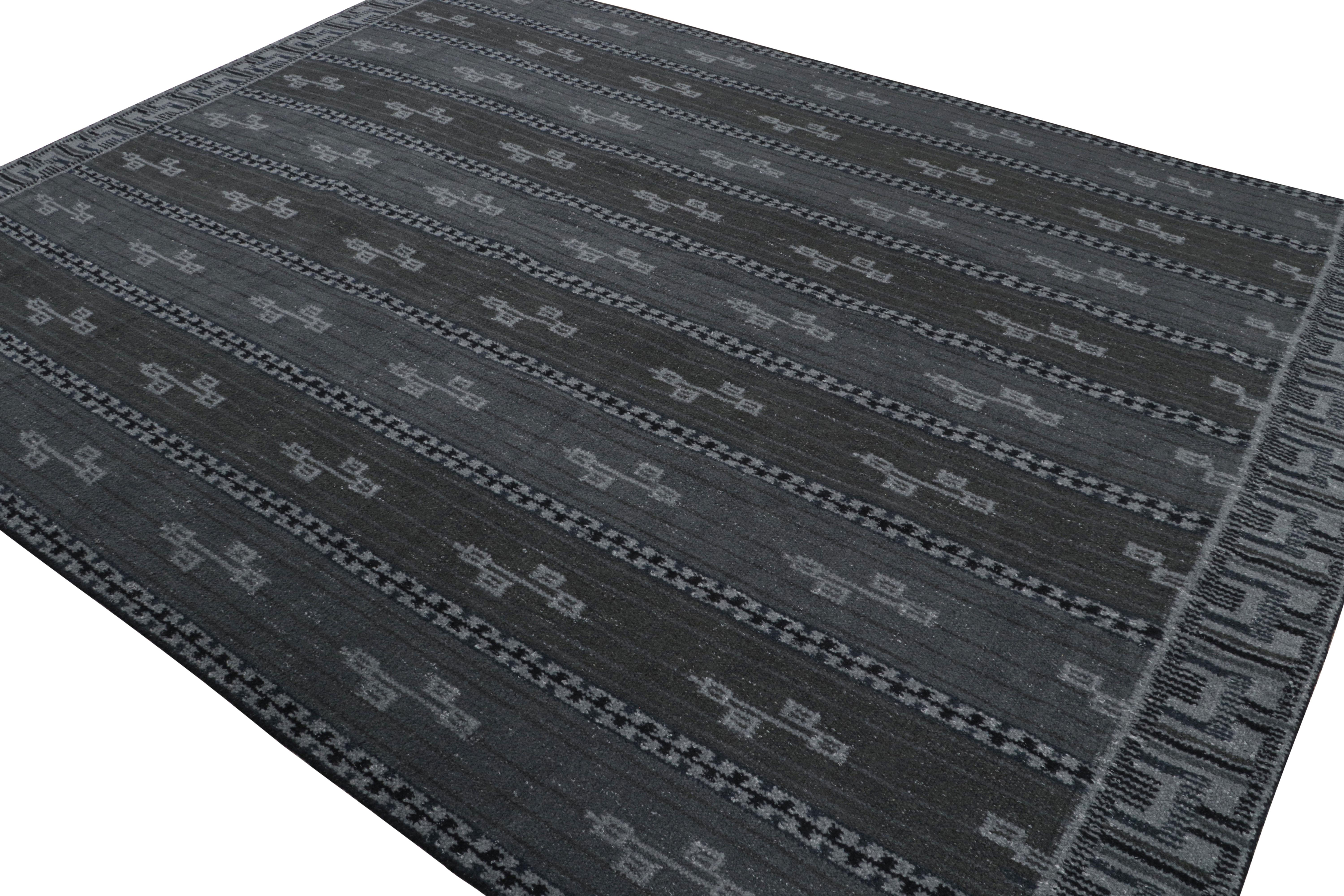 Questo tappeto 9×12 della Rug & Kilim's Scandinavian Collection è tessuto a mano con una nuova struttura a trama piatta che utilizza una miscela di lana e filati esotici. Il suo design è una nuova edizione della serie 