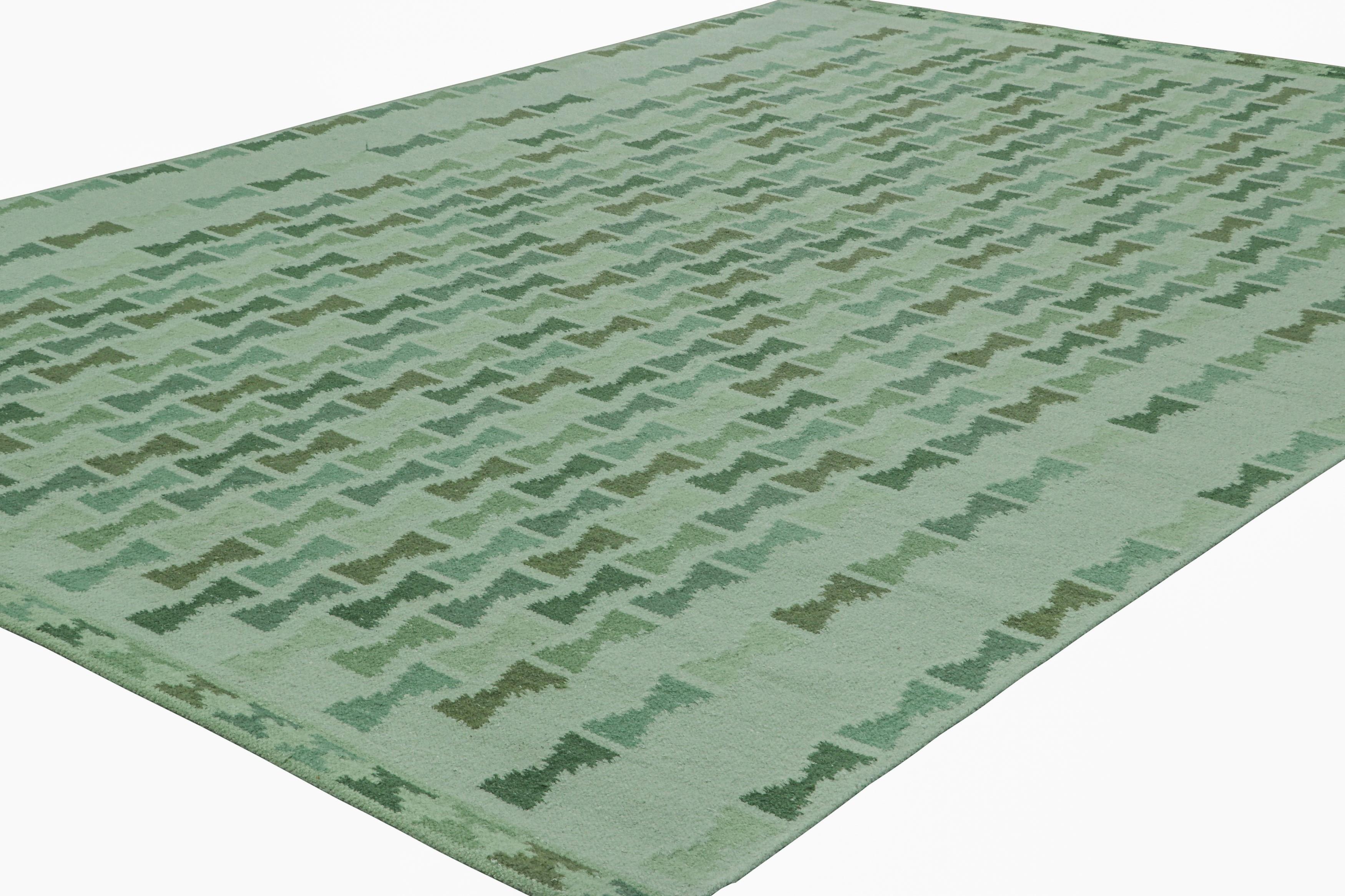 Indiano Rug & Kilim è un tappeto in stile scandinavo con motivi a clessidra in verde e blu acqua in vendita