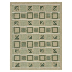 Tapis de style scandinave à motifs géométriques verts, beiges et bruns de Rug & Kilim