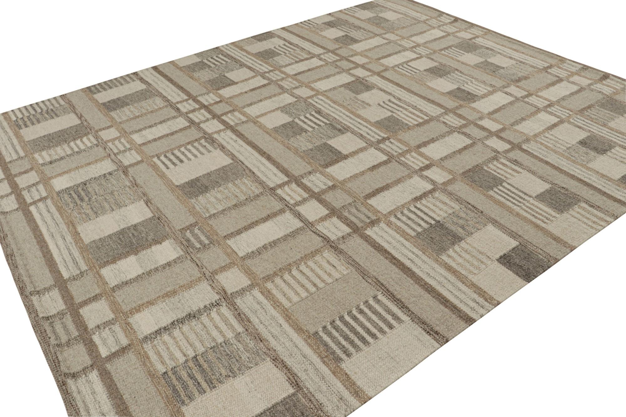 A smart 8x10 Swedish style kilim from our award-winning Scandinavian flat weave collection. Handwoven in wool, cotton & undyed natural yarns.

On the Design: 

This rug enjoys geometric patterns in grey, beige & brown. Keen eyes will admire undyed,