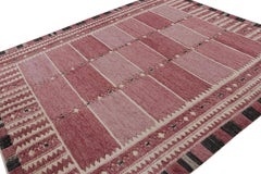 Rug & Kilim’s Scandinavian Style Rug with Pink Geometric Patterns
