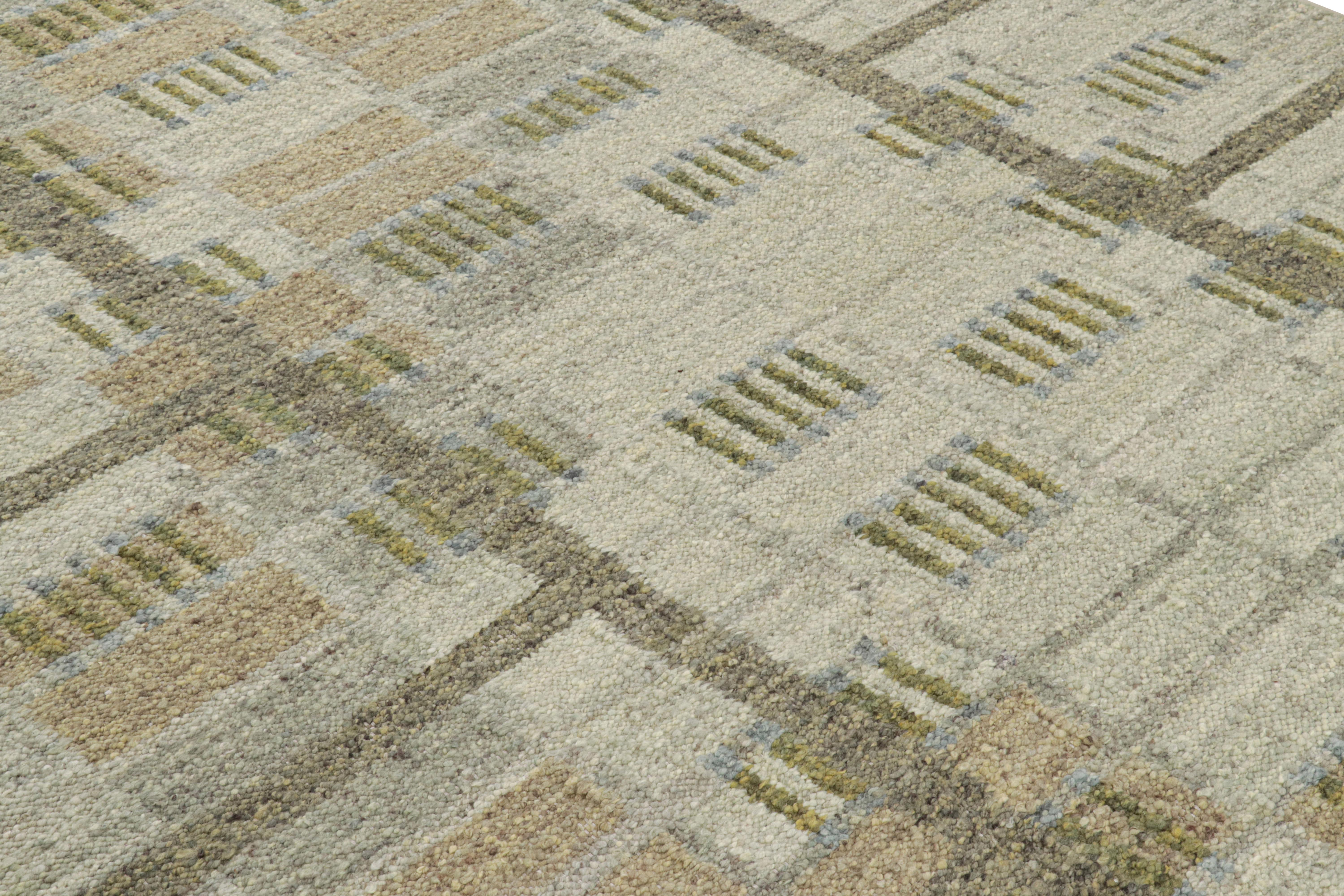 Ce tapis de style suédois 8x10, tissé à la main en laine, est issu de la texture inventive 