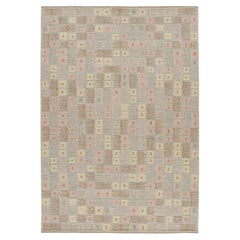 Rug & Kilim’s Scandinavian Style Rug with Polychromatic Geometric Patterns