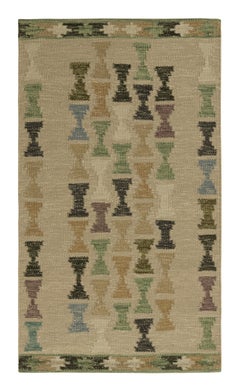 Tapis de style scandinave à motifs polychromes en sablier de Rug & Kilim
