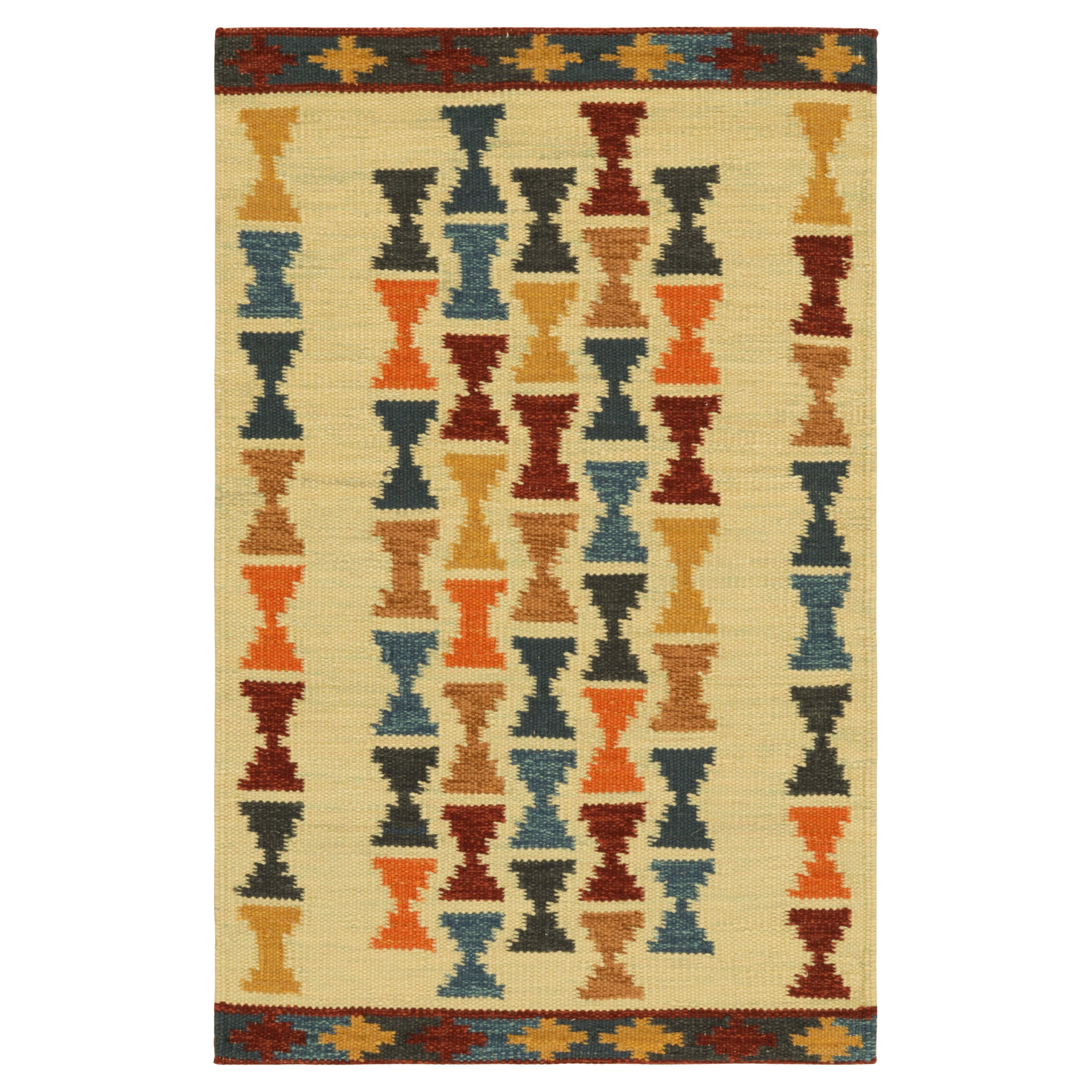 Rug & Kilim’s Scandinavian Style Rug with Polychromatic Hourglass Patterns For Sale