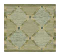Tapis carré de style scandinave à motifs bleus et verts de Rug & Kilim