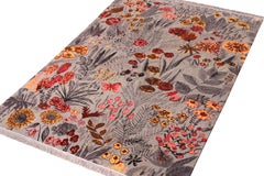 Rug & Kilim’s Seirafian Style Rug in Gray and Red Floral Pattern